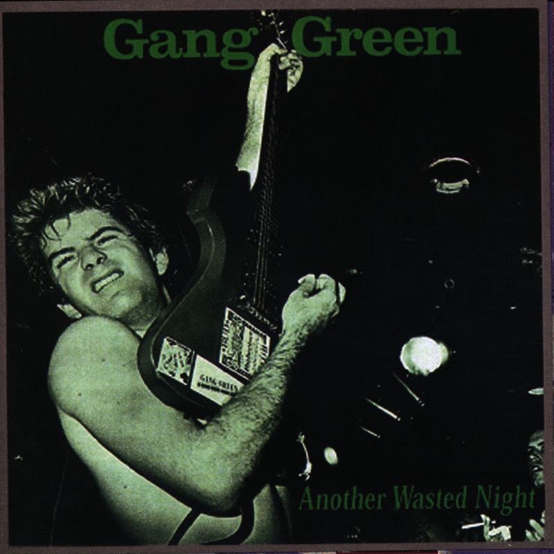 Cover of Another Wasted Night by Gang Green: a shirtless Chris Doherty playing guitar on stage, in green duotone