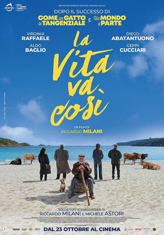 Poster for La vita va così by Riccardo Milani: an elderly shepherd sits with his stick and a small dog on a Sardinian beach, with people and cows standing behind him facing the sea